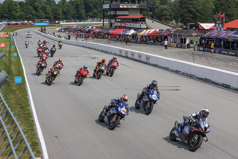 Beaubier leads the field into turn one on the restart of the Saturday Superbike race