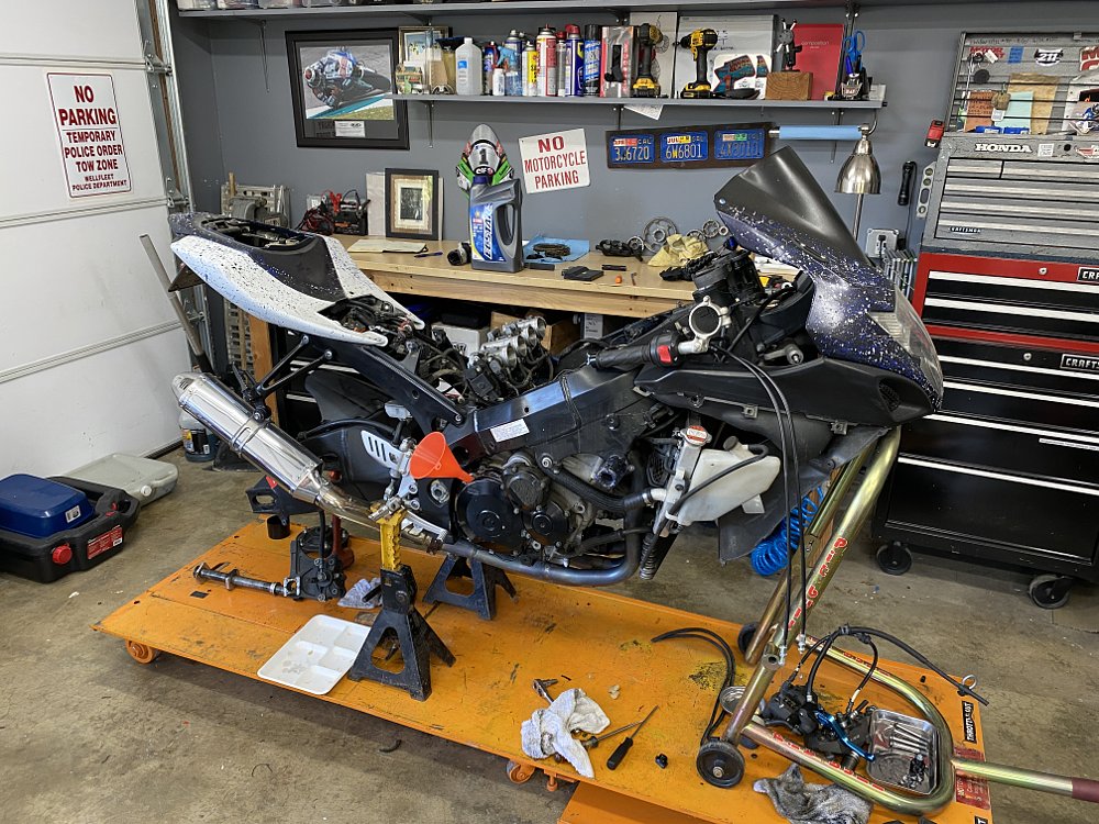 Motorcycle on a workbench being overhauled