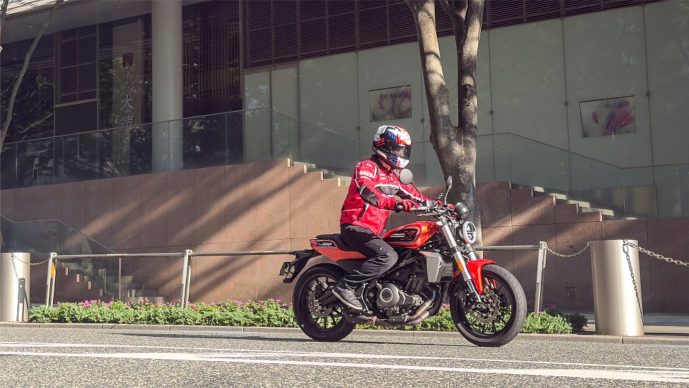 Dustin rides the X350 through the Roppongi Hills neighborhood of Minato City, Tokyo.