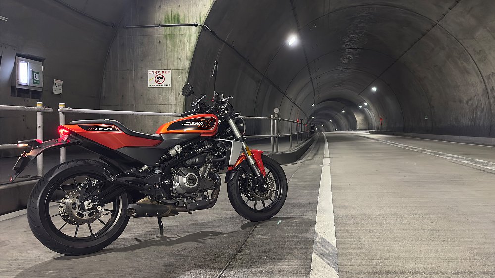 The Harley X350 parked roadside in a tunnel. 