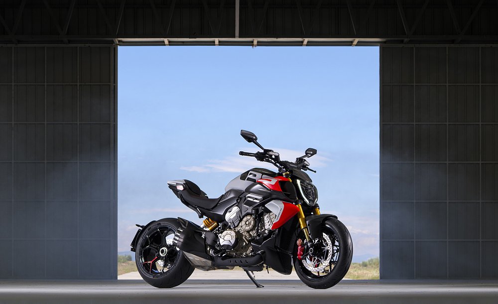 black and red Diavel V4 RS parked in a hangar