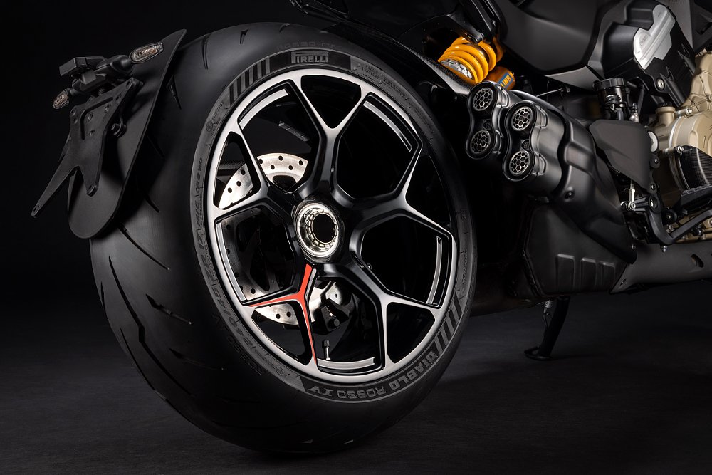 view of the large rear wheel and tire with single-sided swingarm