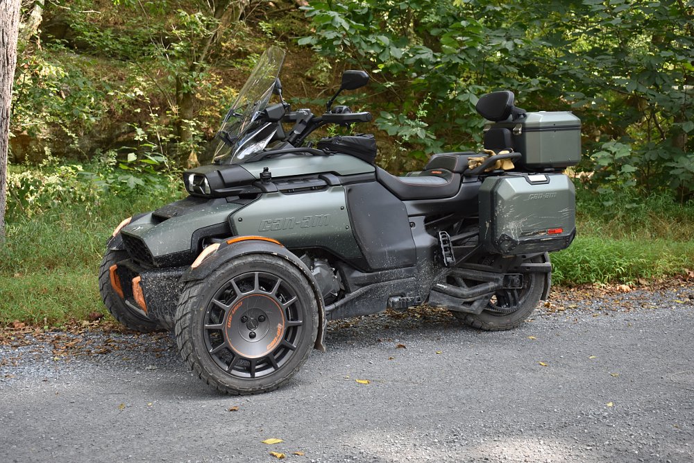 photo of the Canyon Redrock at trailside with mud splattered on it