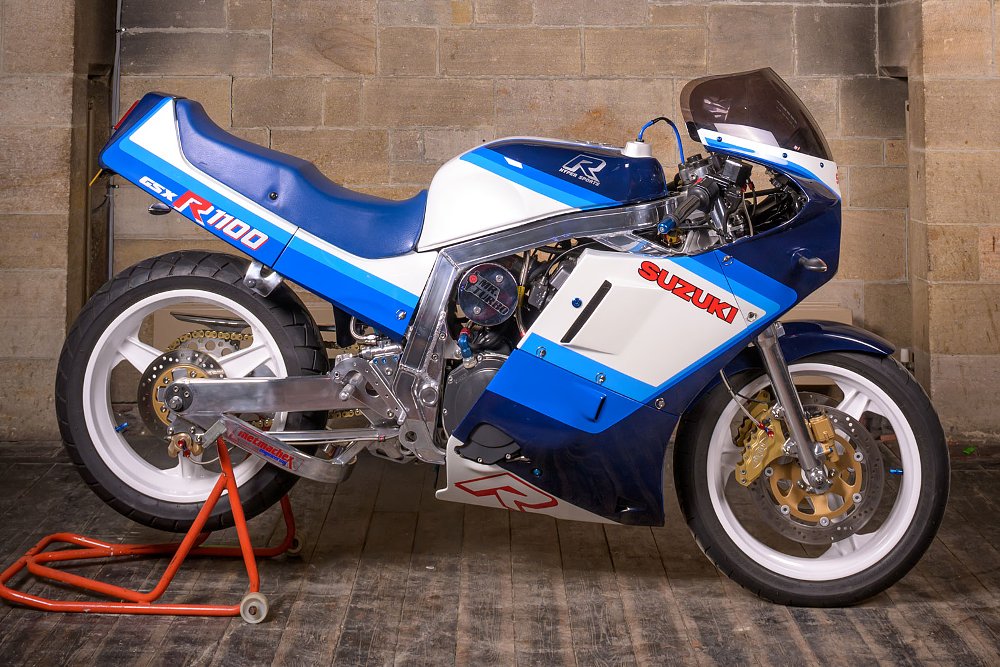 blue and white Suzuki sport bike