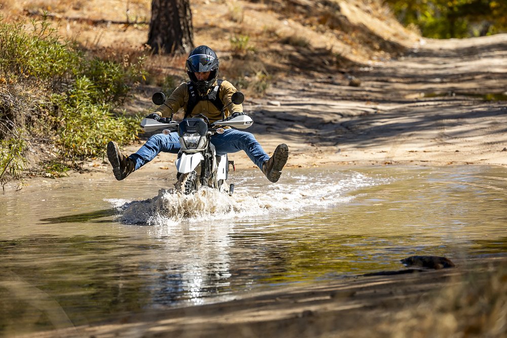 2026 KLX230 Sherpa in a puddle